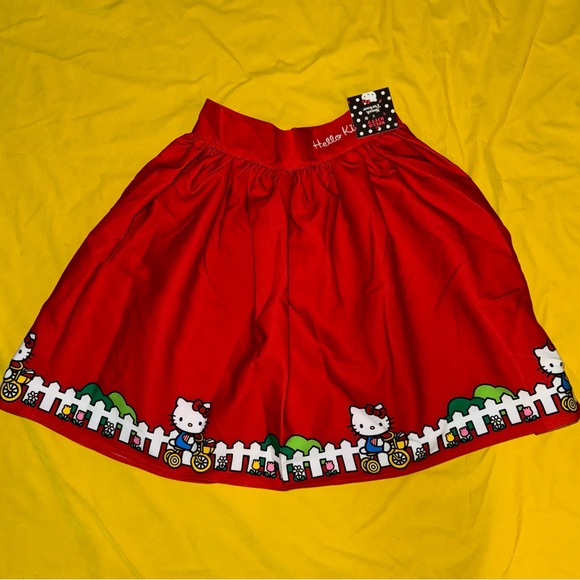 Adorable Hello Kitty red skirt with Hello Kitty print all around the bottom. - Picture 2 of 7